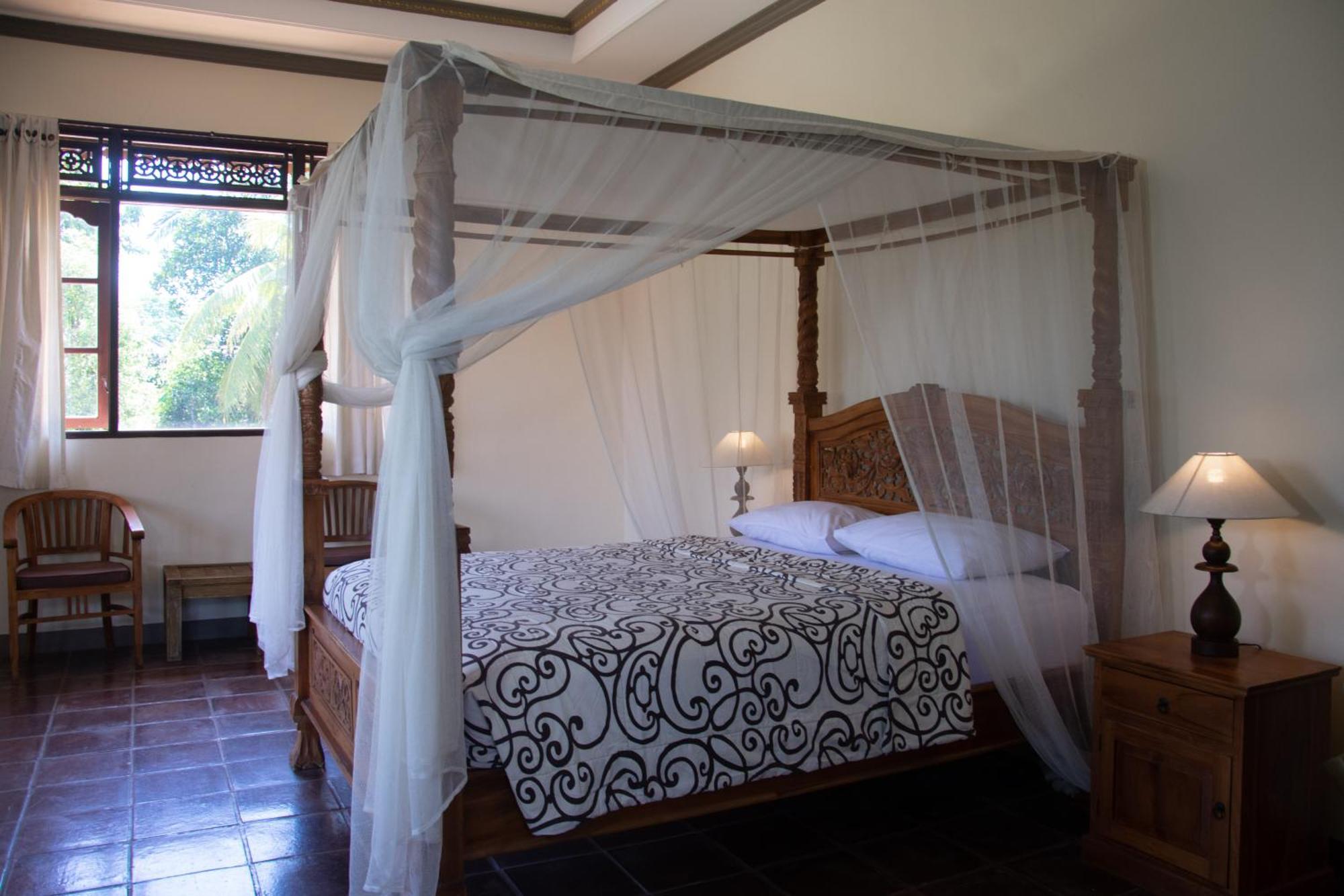 Uma Capung Mas Cottage Ubud Værelse billede