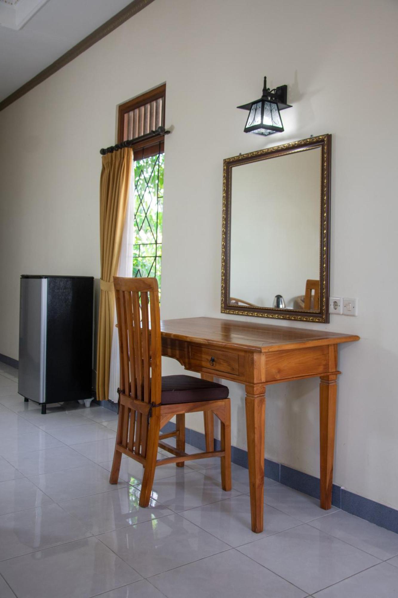 Uma Capung Mas Cottage Ubud Værelse billede