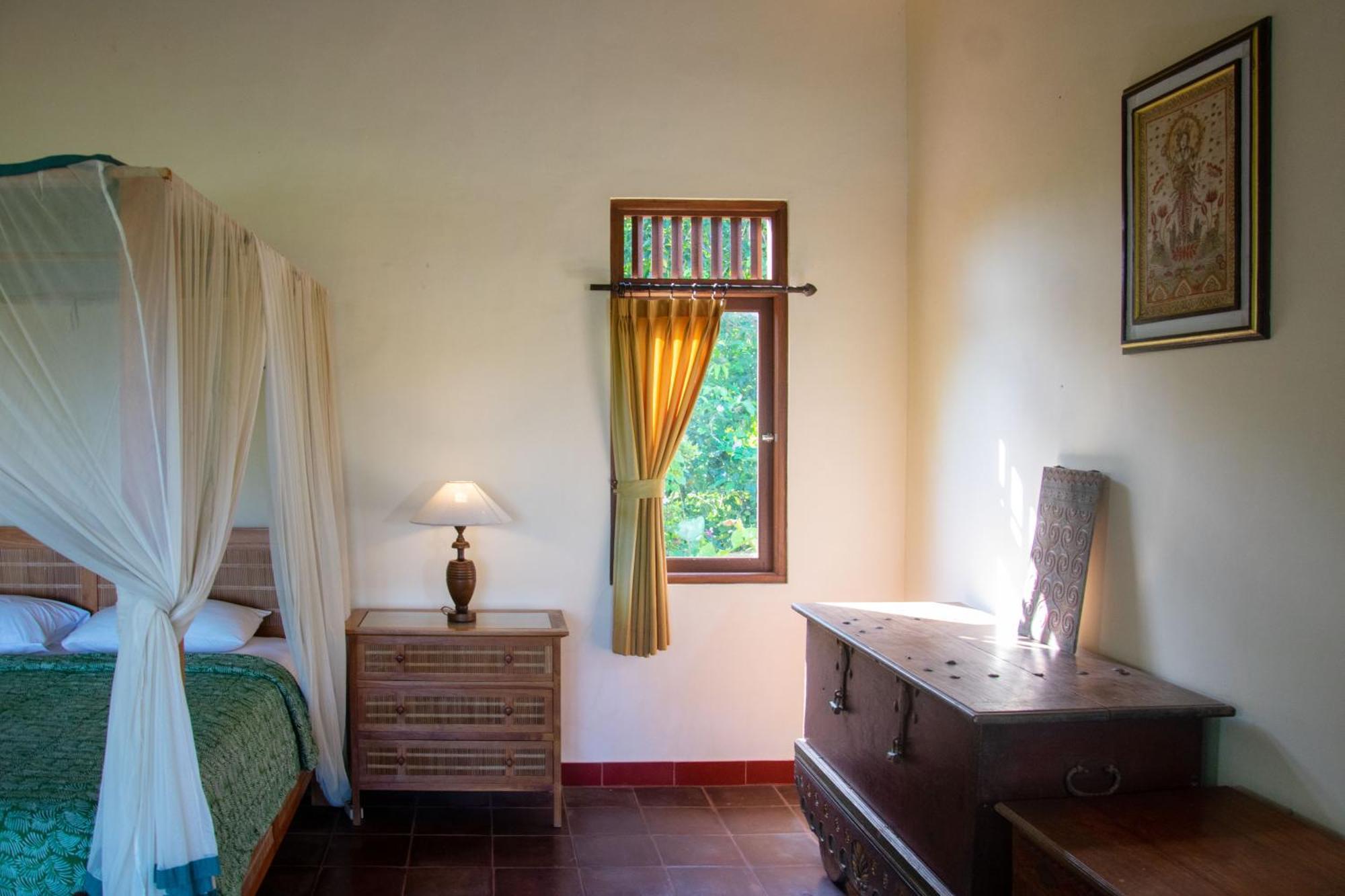 Uma Capung Mas Cottage Ubud Værelse billede