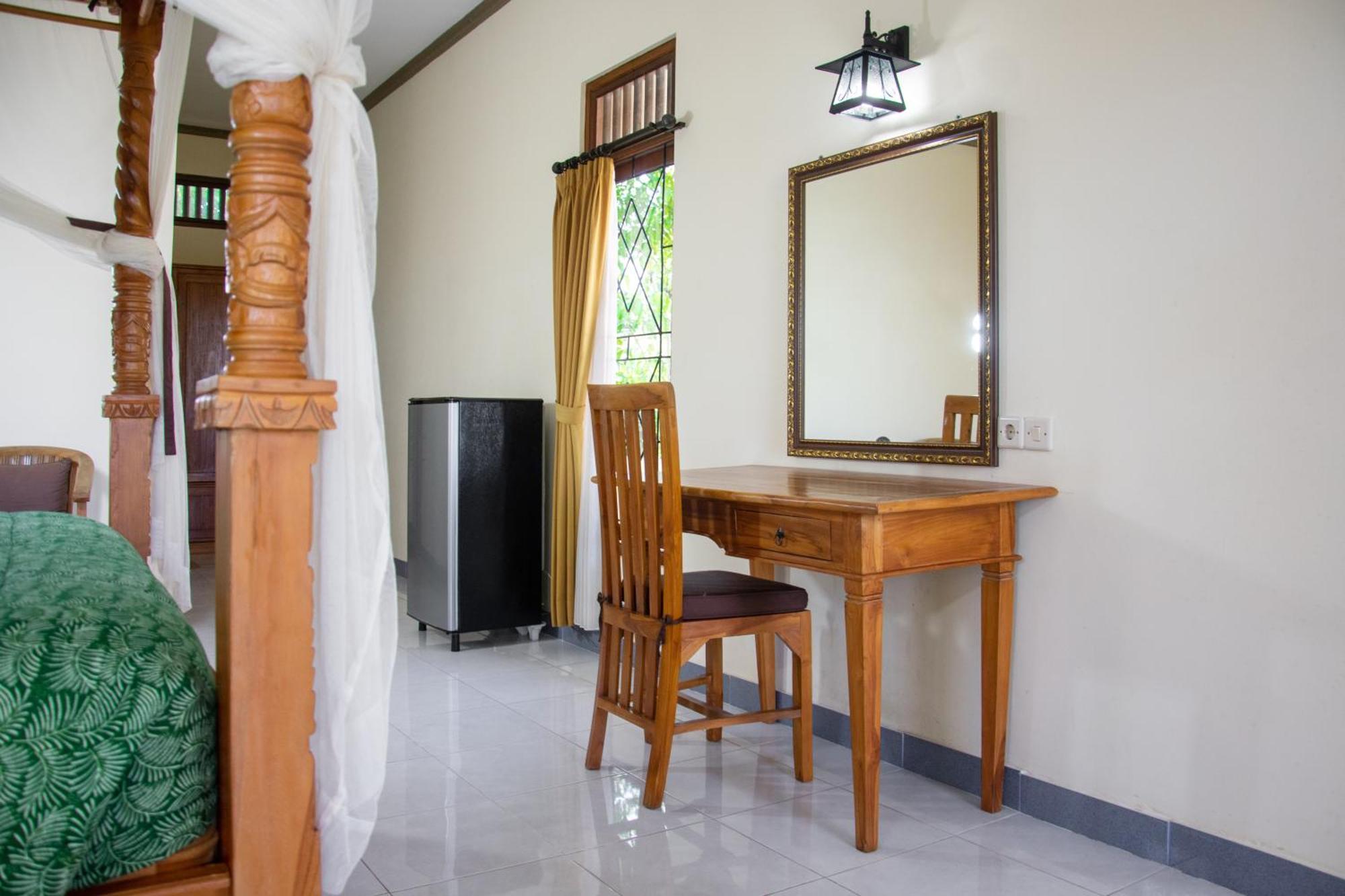 Uma Capung Mas Cottage Ubud Værelse billede
