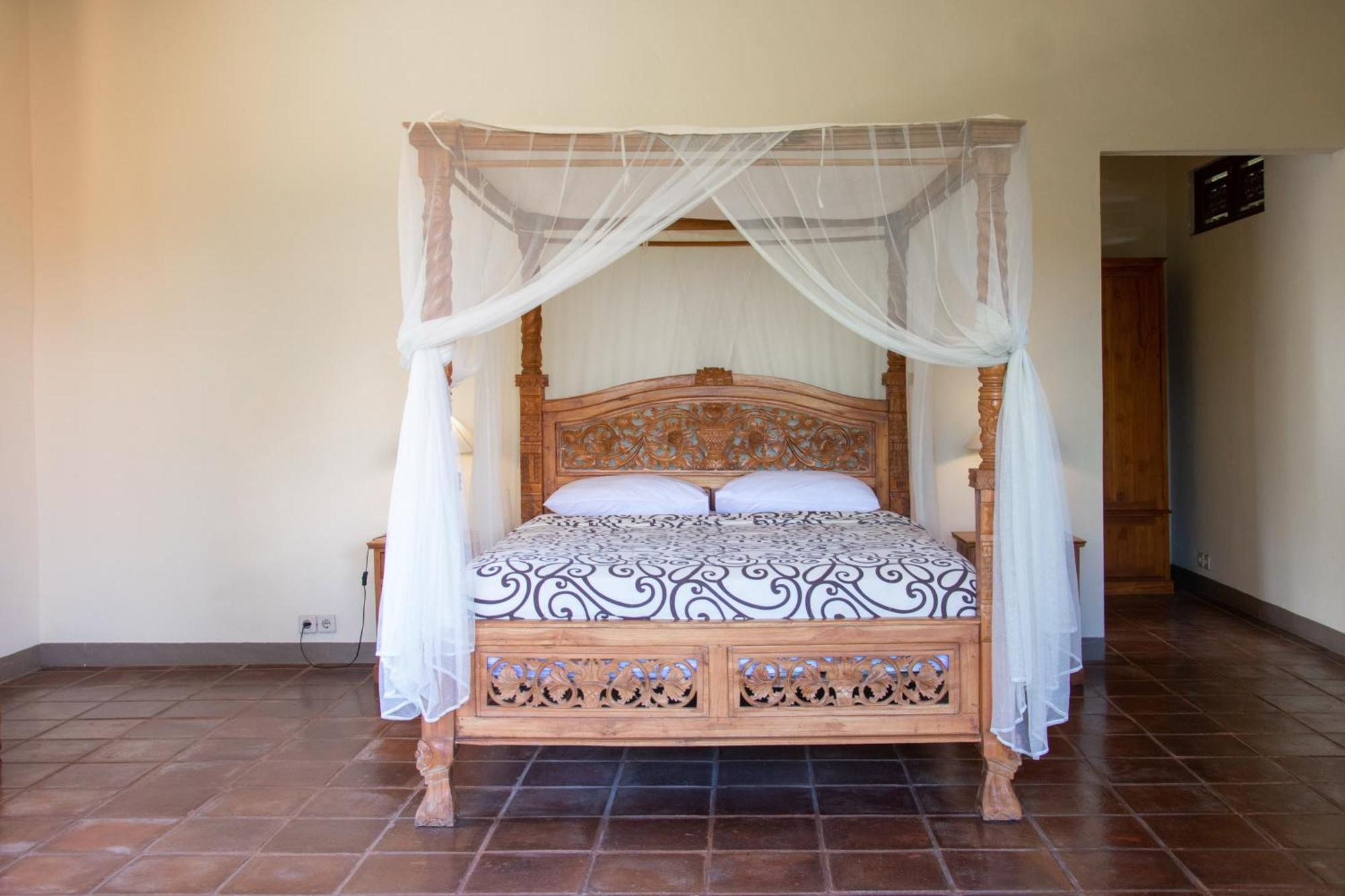 Uma Capung Mas Cottage Ubud Værelse billede